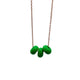 Bright Green polymer clay beads on a gold plated stainless steel chain on a white background