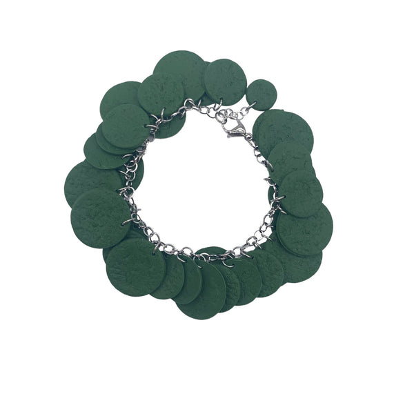 Dark green polymer clay bracelet on white background