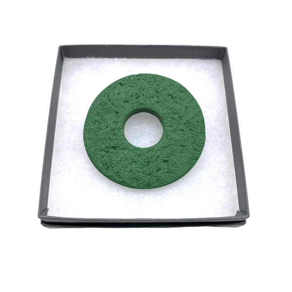 Dark Green polymer clay brooch in a box on a white background