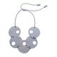 Grey polymer clay statement necklace on a white background 