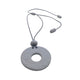 Grey Polymer clay necklace and glasses holder on a white background