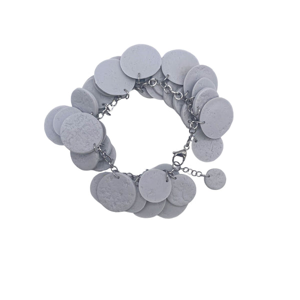 Grey polymer clay bracelet on white background