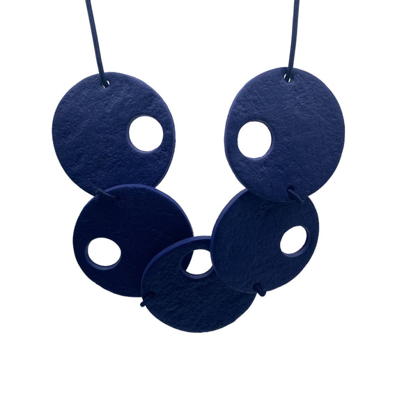 Navy Blue polymer clay statement necklace on a white background