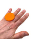 Someone wearing Orange Large Polymer Clay Ring against a white background