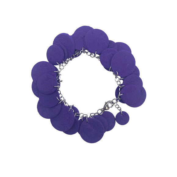 Purple polymer clay bracelet on white background