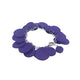 Purple polymer clay bracelet on white background