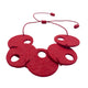 Red polymer clay statement necklace on a white background 