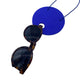 Large Royal Blue Polymer Clay Statement necklace  holding sunglasses on a white background 