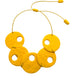 Yellow polymer clay statement necklace on a white background 