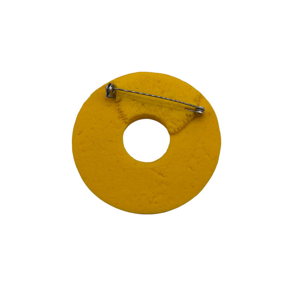 Yellow Polymer Clay Brooch on a white background 