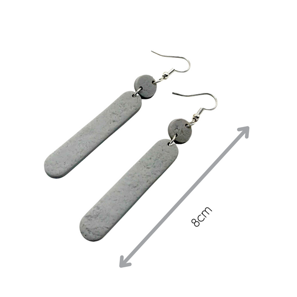 Grey Polymer Clay Dangle earrings with shepherd hooks showing length of earrings