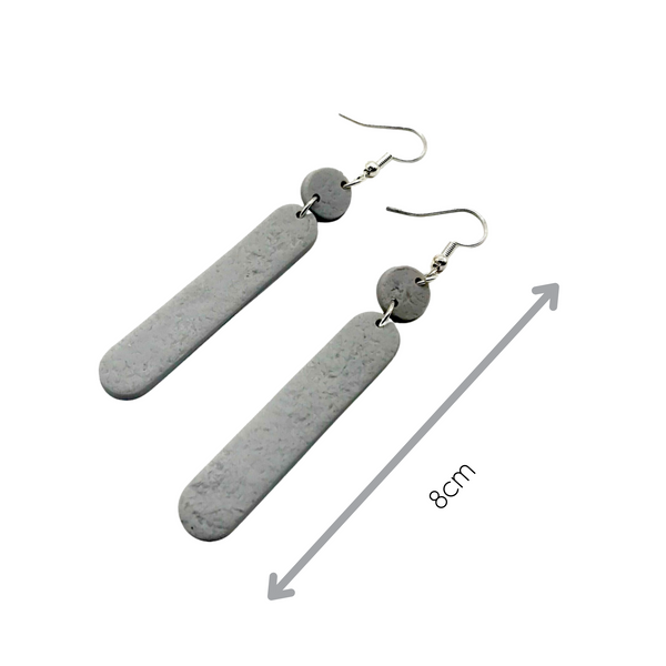 Grey Polymer Clay Dangle earrings with shepherd hooks showing length of earrings