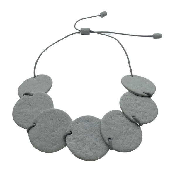 Grey polymer clay statement necklace with overlapping discs on elastic cord Cara 1