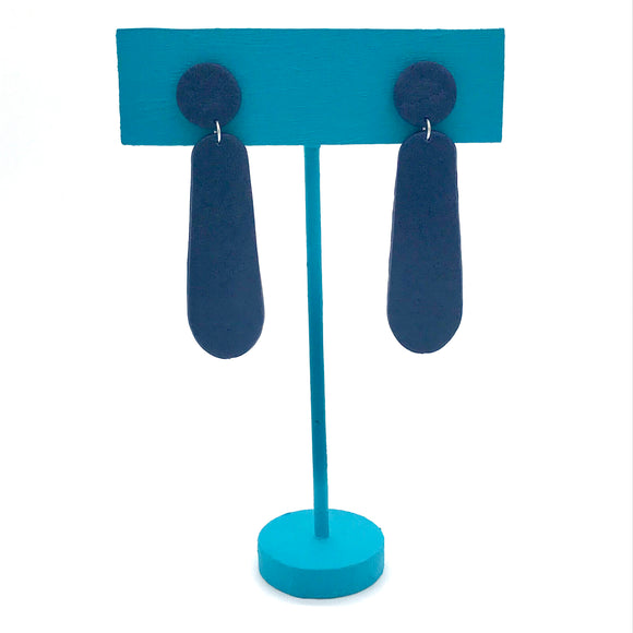 Navy Blue Polymer Clay Dangle earrings on turquoise stand